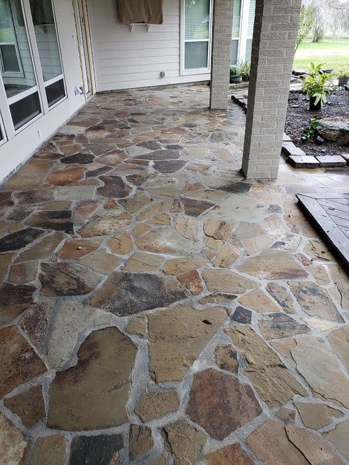 the best flagstone patio installation by Helms Landscape