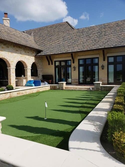 beautiful and affordable artificial turf putting greens installation by Helms Landscape