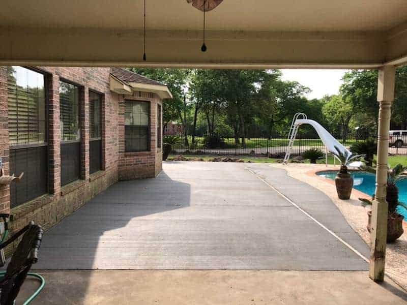 Concrete patio extensions professionally installed by Helms Landscaping in Houston Texas