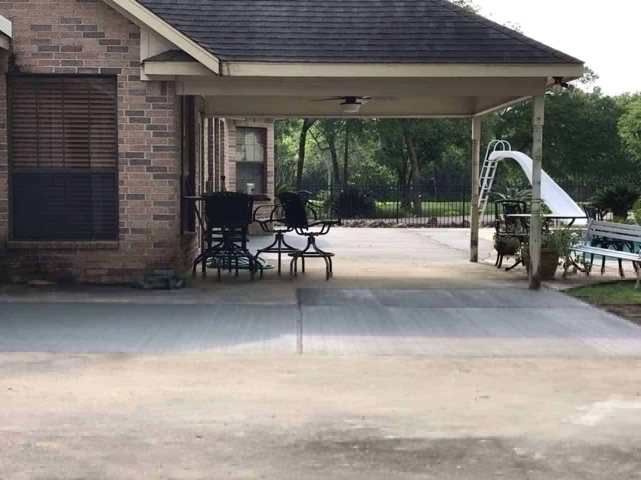 Concrete patio extensions professionally installed by Helms Landscaping in Houston Texas