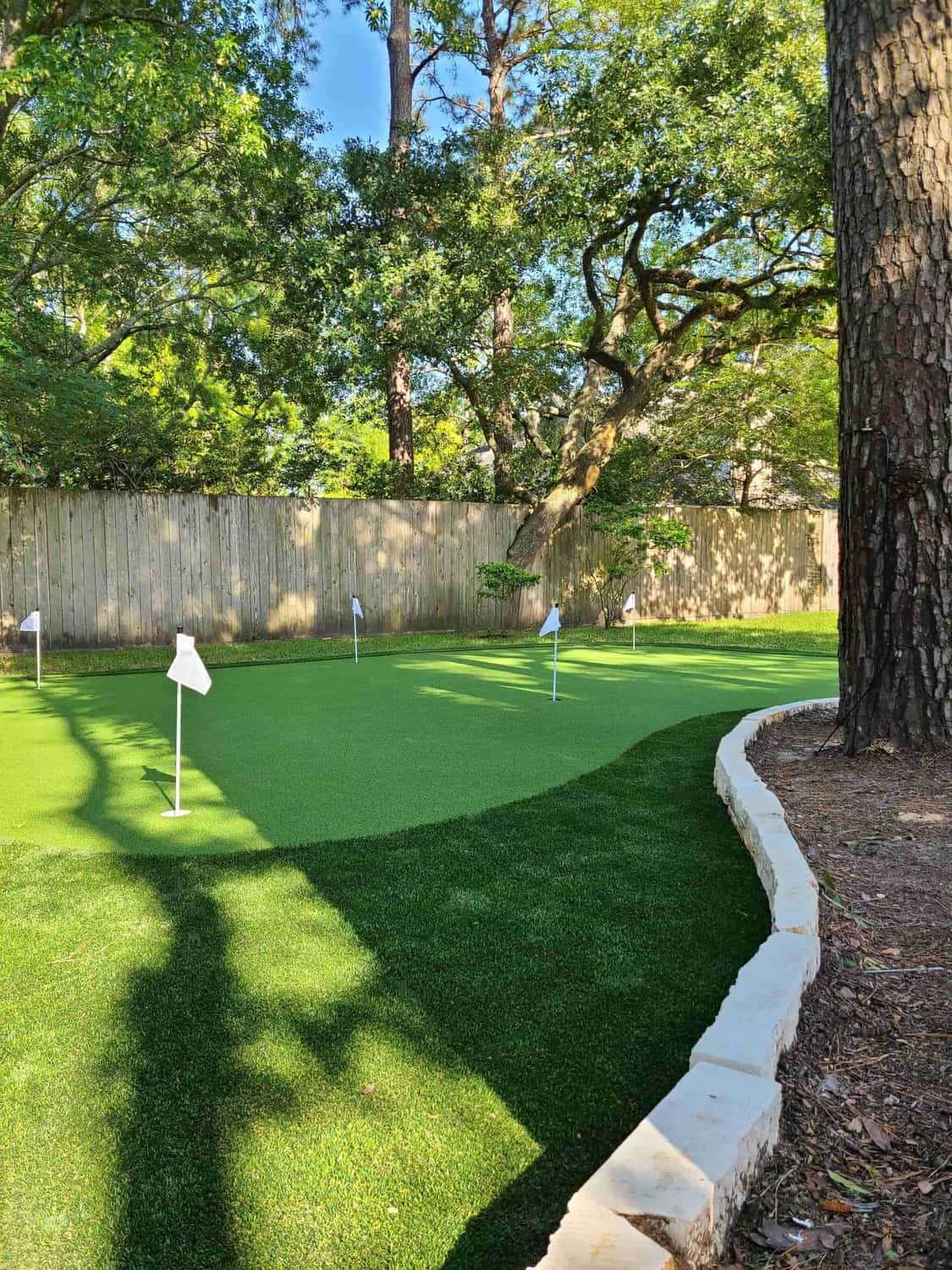 putting green landscaping instalation services completed for Houston, Texas residence