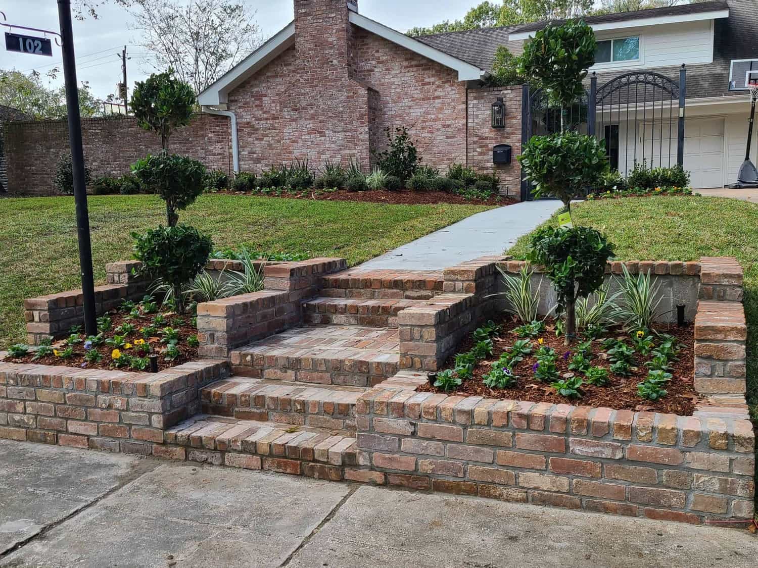 new hardscape steps in the front of a house