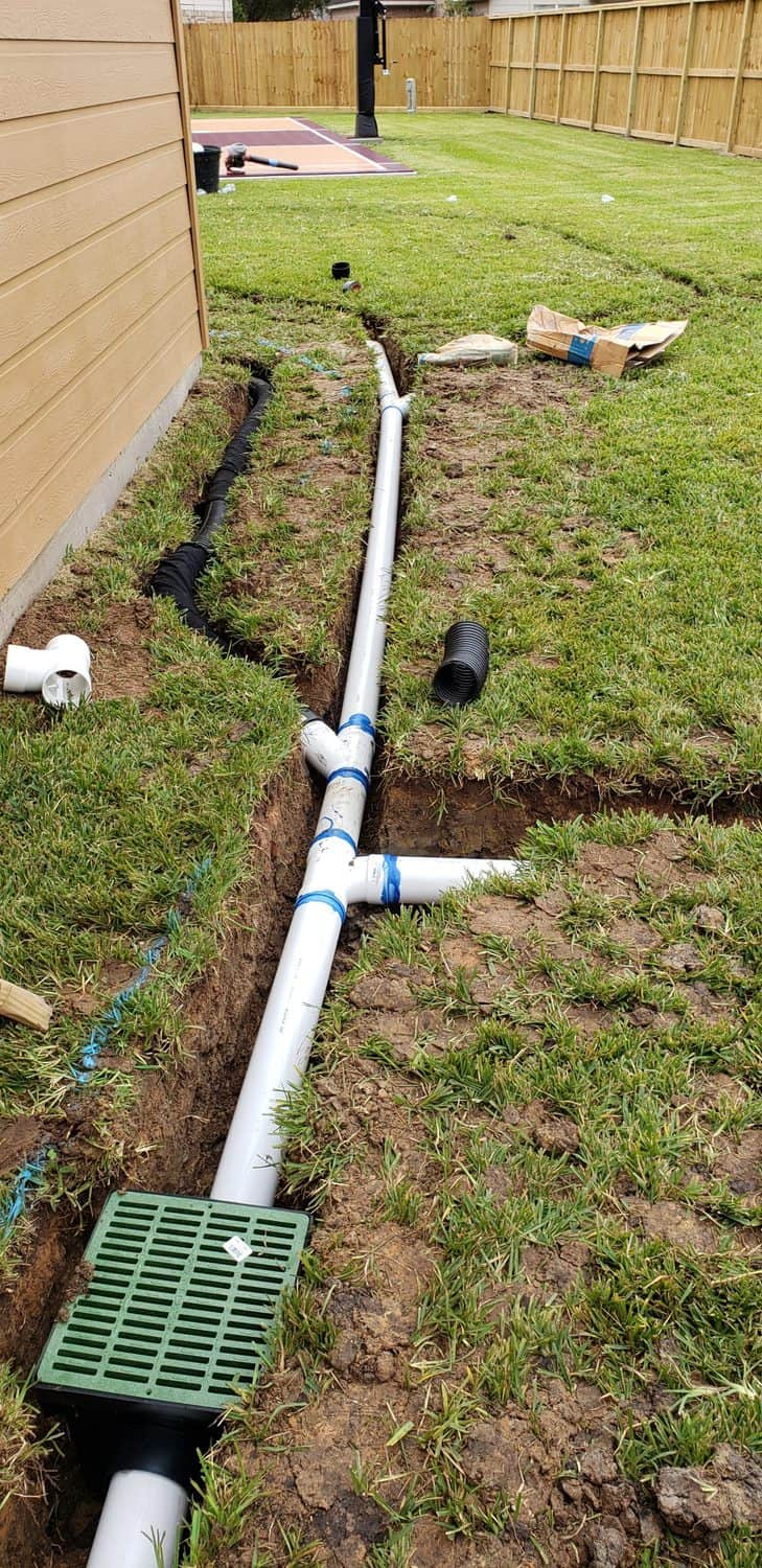 landscaping work done in Houston, Texas residence pipe trench